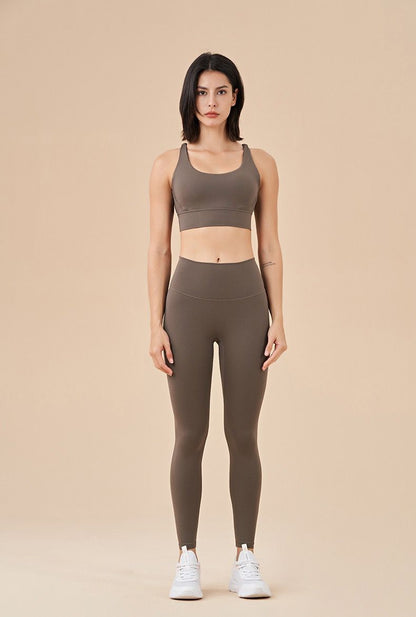 Taupe leggings and sports bra